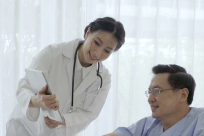  physician take care of sick patient at the hospital